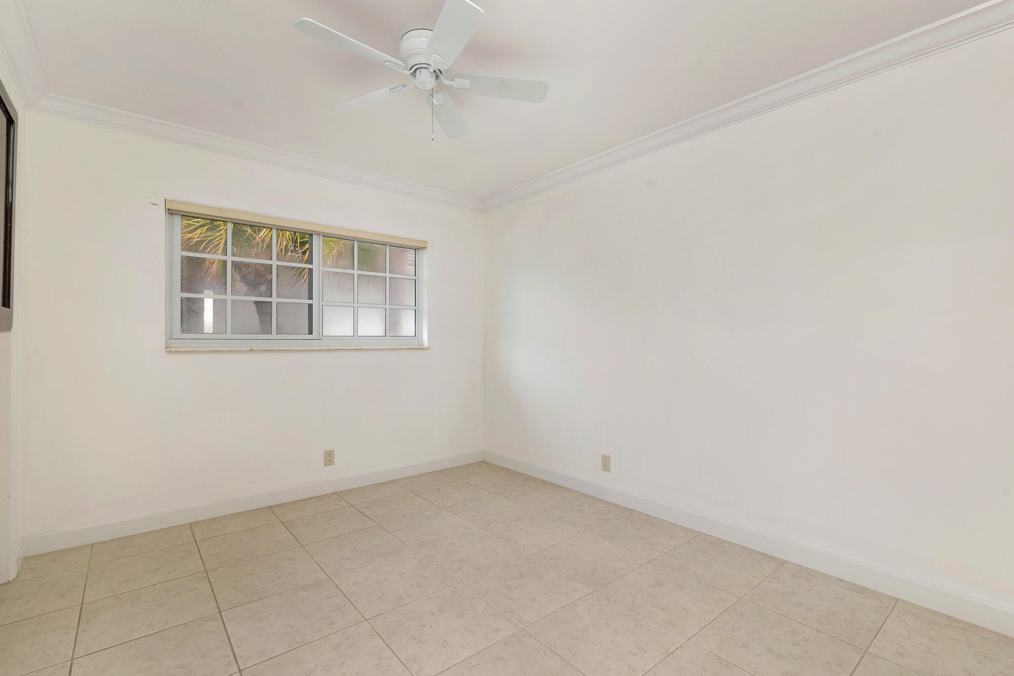 5505 North Ocean Boulevard, Unit 15204 Ocean Ridge, FL 33435 - Photo 20 of 34 an empty room with a window