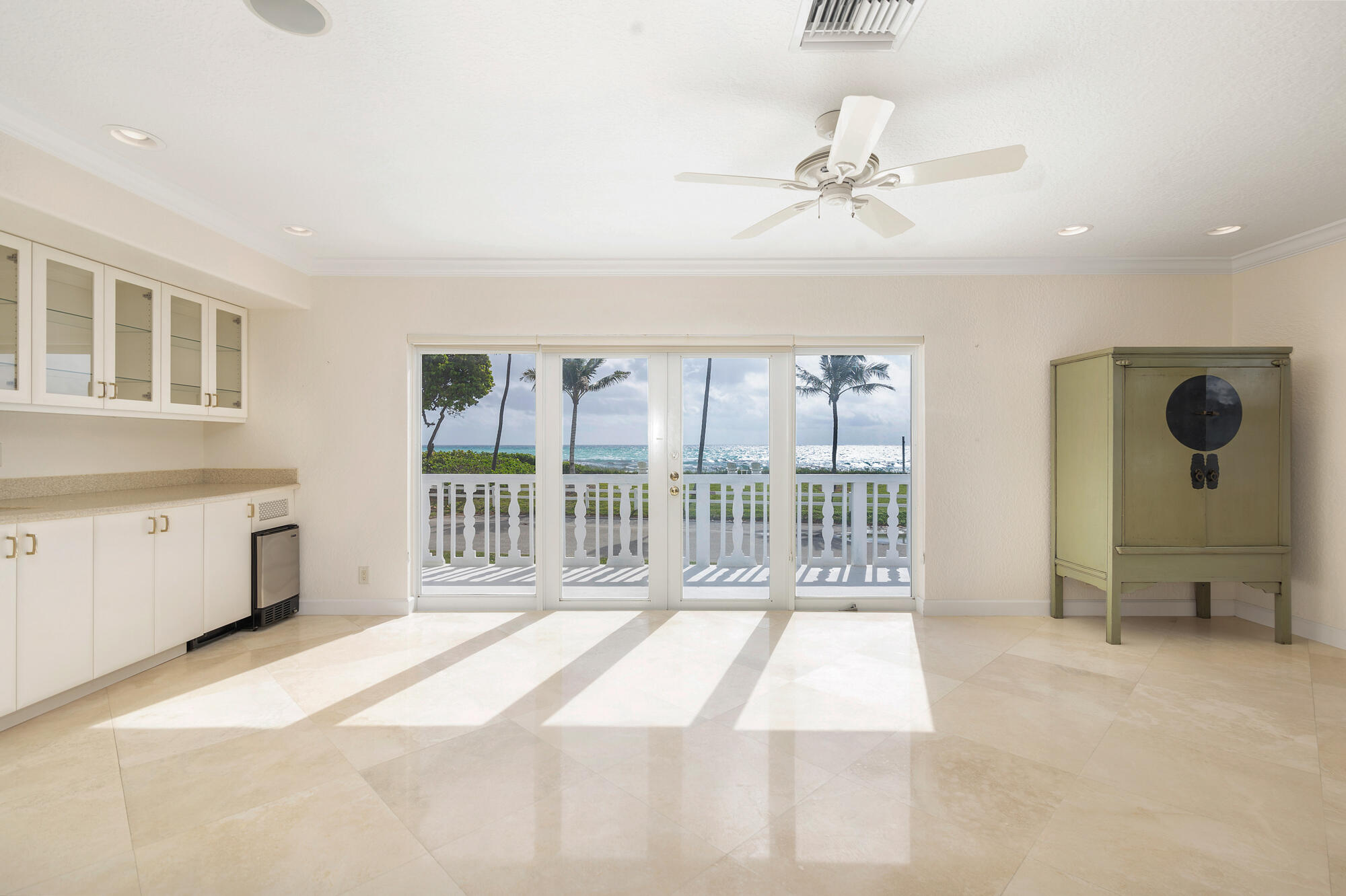 5505 North Ocean Boulevard, Unit 15204 Ocean Ridge, FL 33435 - Photo 2 of 34 a room with a bed and a large window