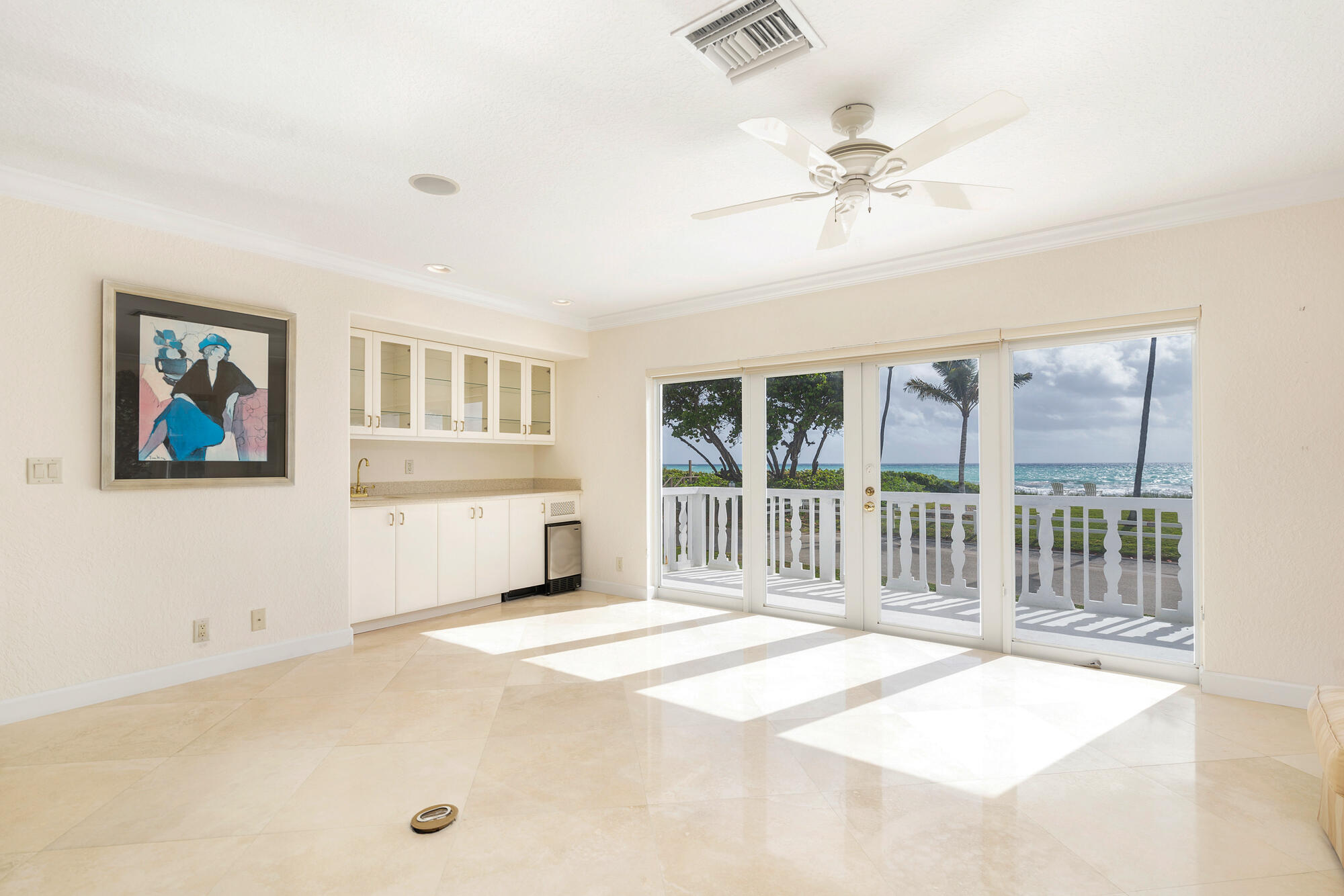 5505 North Ocean Boulevard, Unit 15204 Ocean Ridge, FL 33435 - Photo 3 of 34 a view of a livingroom with a ceiling fan