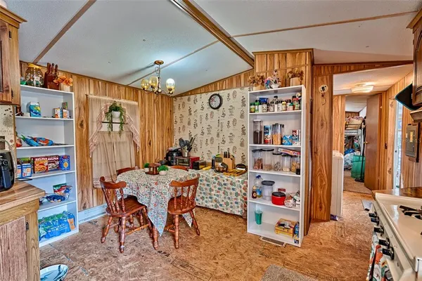 a view of a workspace with furniture