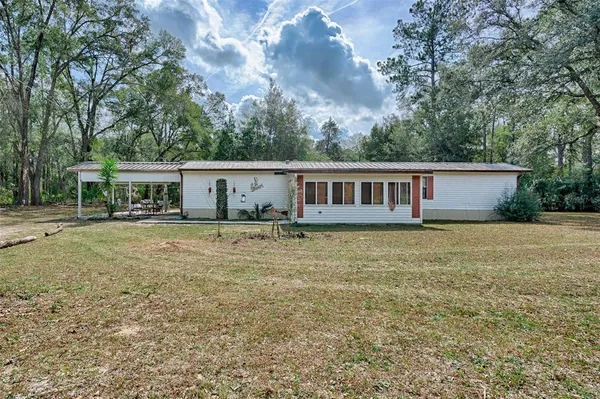a house view with a garden space