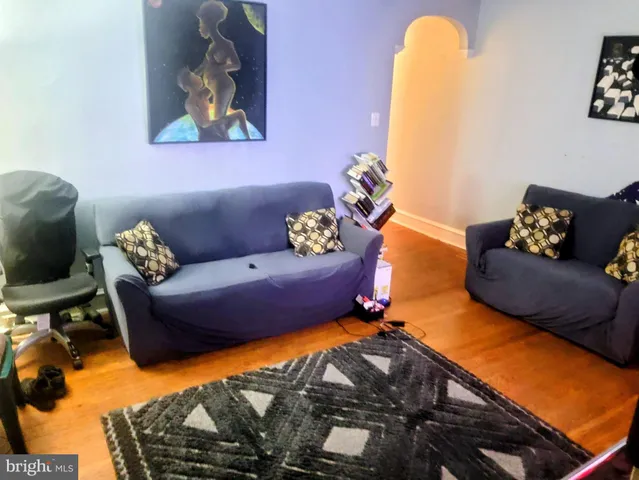 a living room with furniture and a couch