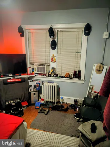 a room with furniture and a flat screen tv