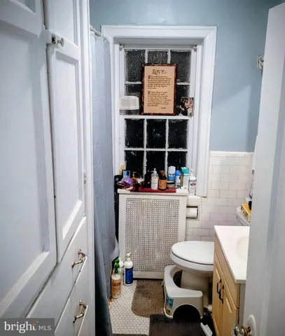 a room with a window and gym equipment