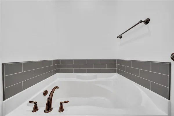 a bathroom with a bathtub