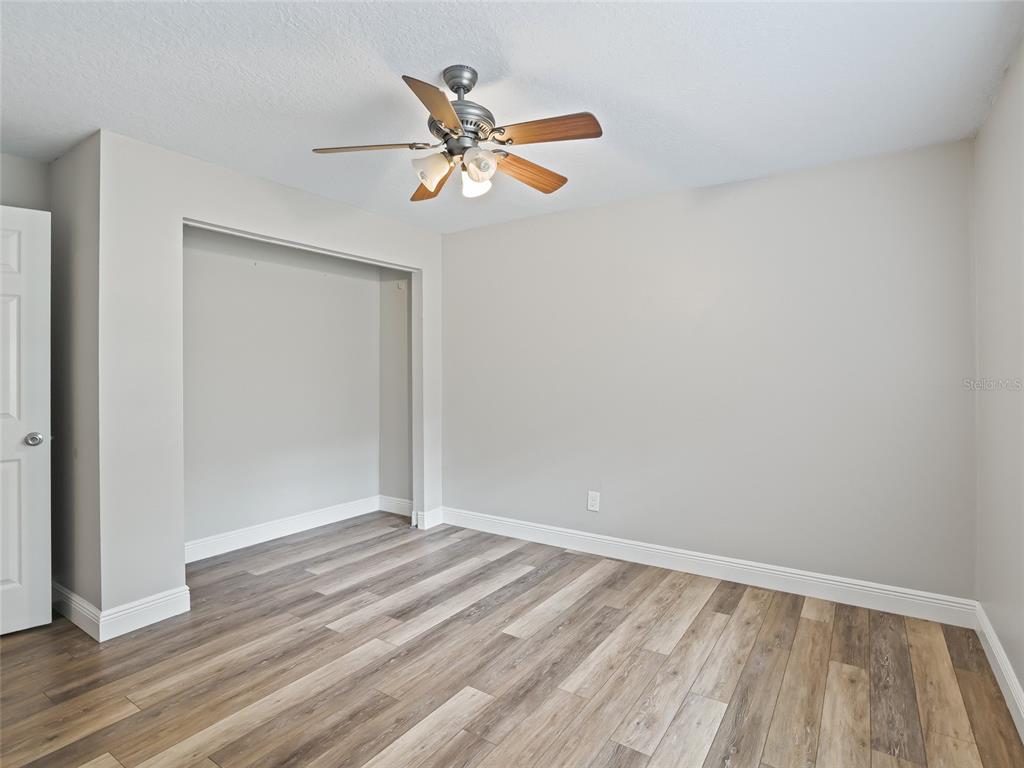 8234 Highway 301 Bushnell, FL 33513 - Photo 26 of 52 a view of wooden floor in a room