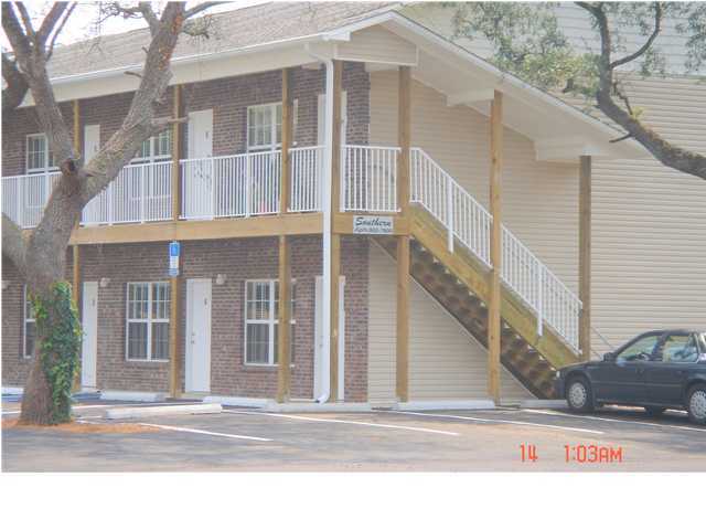 940 Barrow Street, Unit 1 Fort Walton Beach, FL 32547 - Photo 1 of 8 a view of a white building