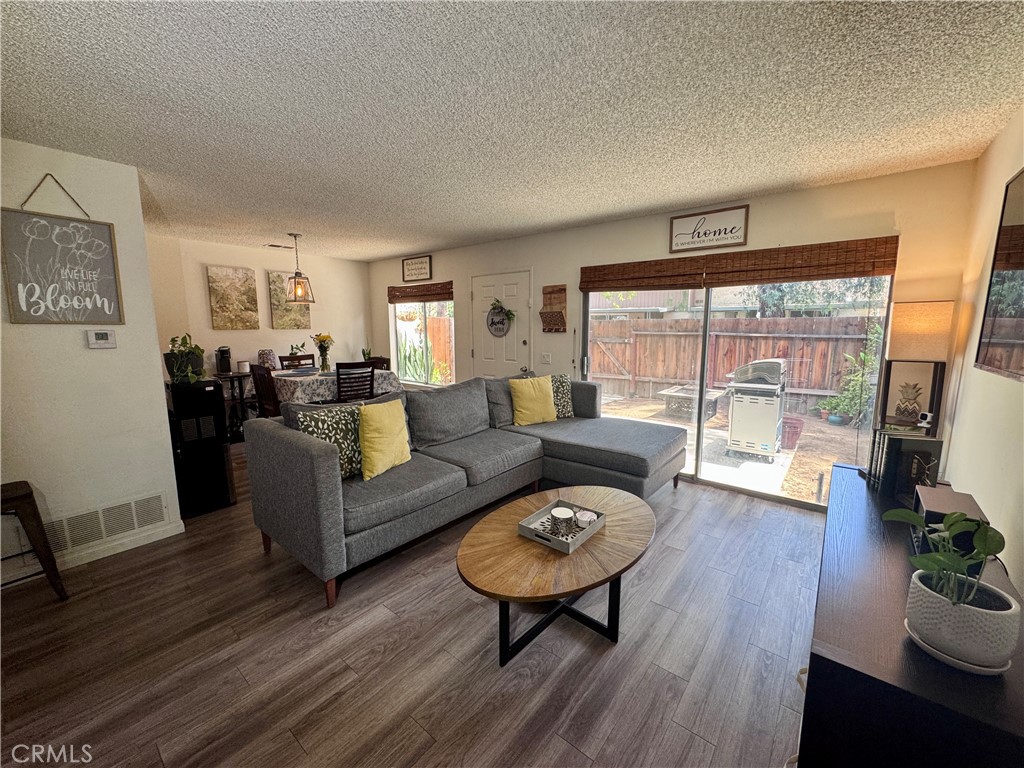 4877 Jackson Street, Unit B Riverside, CA 92503 - Photo 7 of 33 View of the Living Room from the Downstairs Staircase Landing