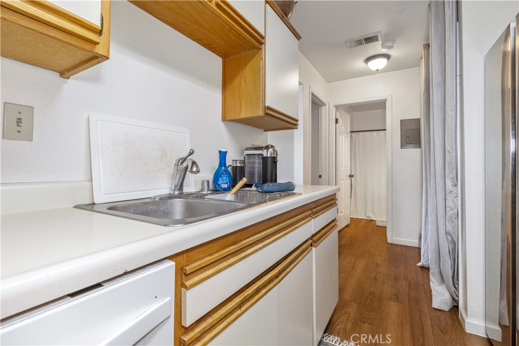 41 Thomas Court Templeton, CA 93465 - Photo 42 of 50 a hallway with sink and mirror