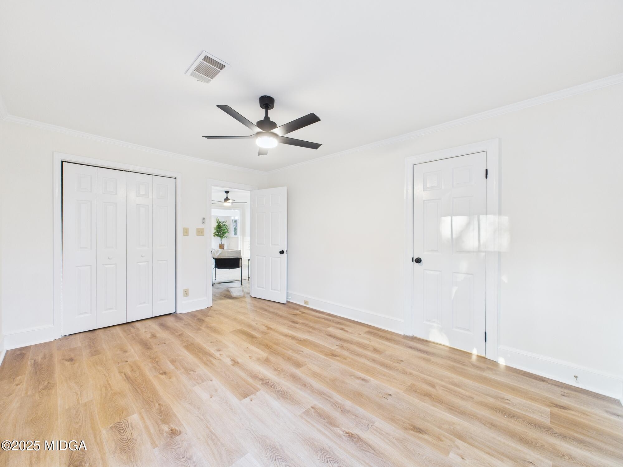 331 Marjane Drive Macon, GA 31210 - Photo 20 of 43 a view of an empty room with wooden floor