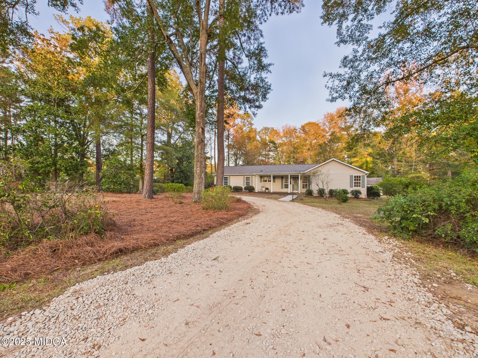 331 Marjane Drive Macon, GA 31210 - Photo 35 of 43 a house with trees in front of it