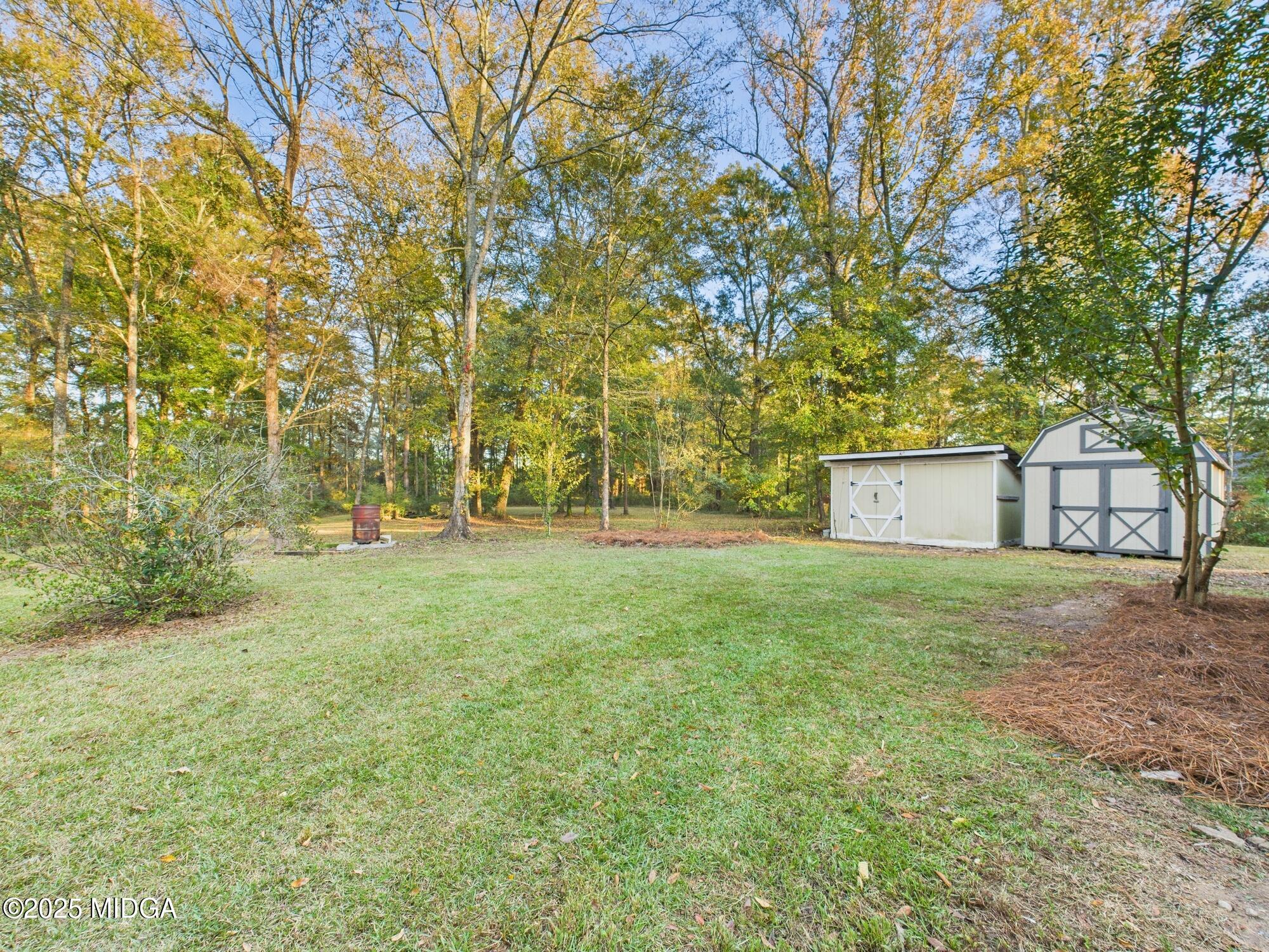 331 Marjane Drive Macon, GA 31210 - Photo 37 of 43 a view of a yard with a tree