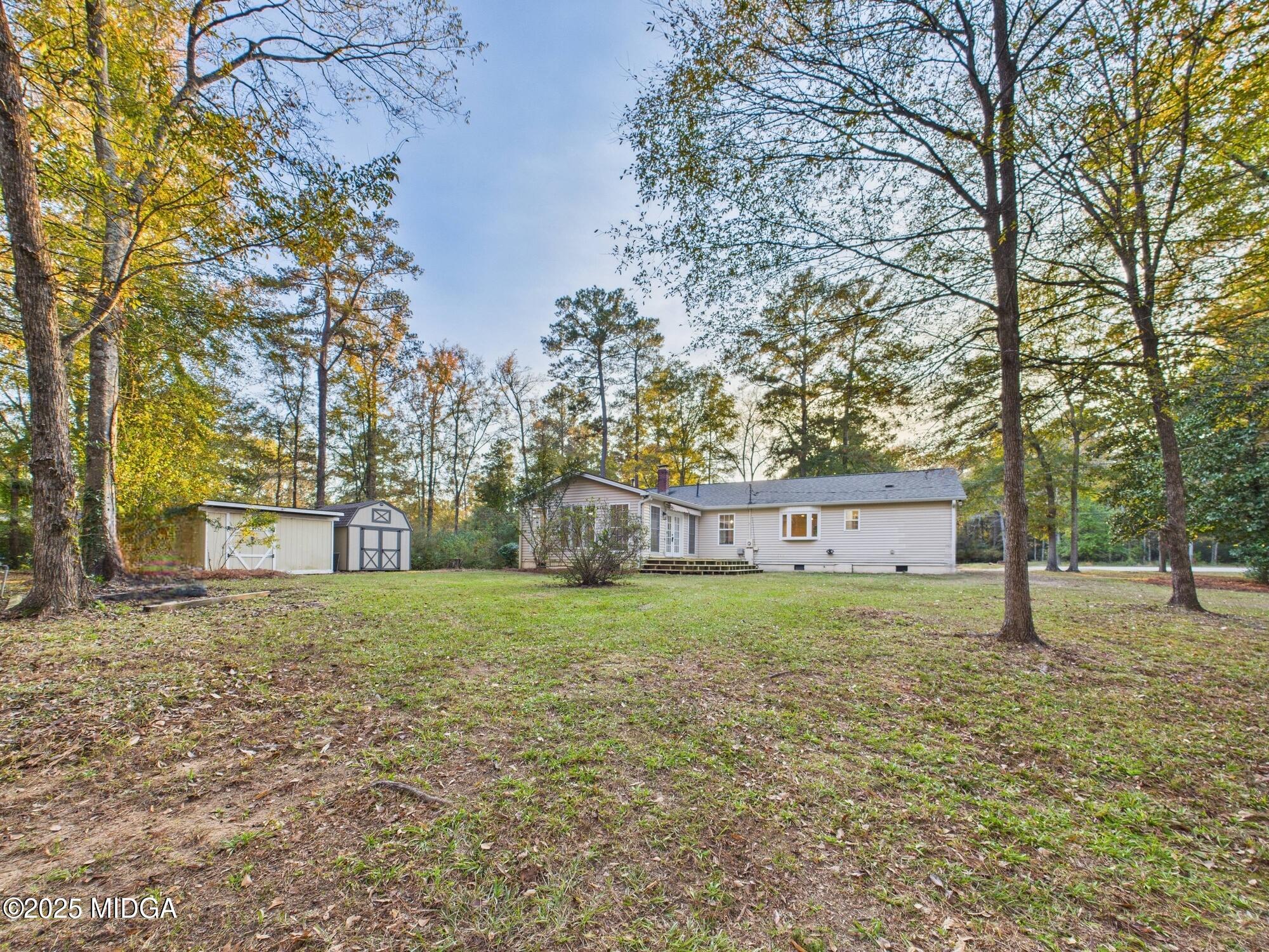 331 Marjane Drive Macon, GA 31210 - Photo 40 of 43 a house with a tree in front of it