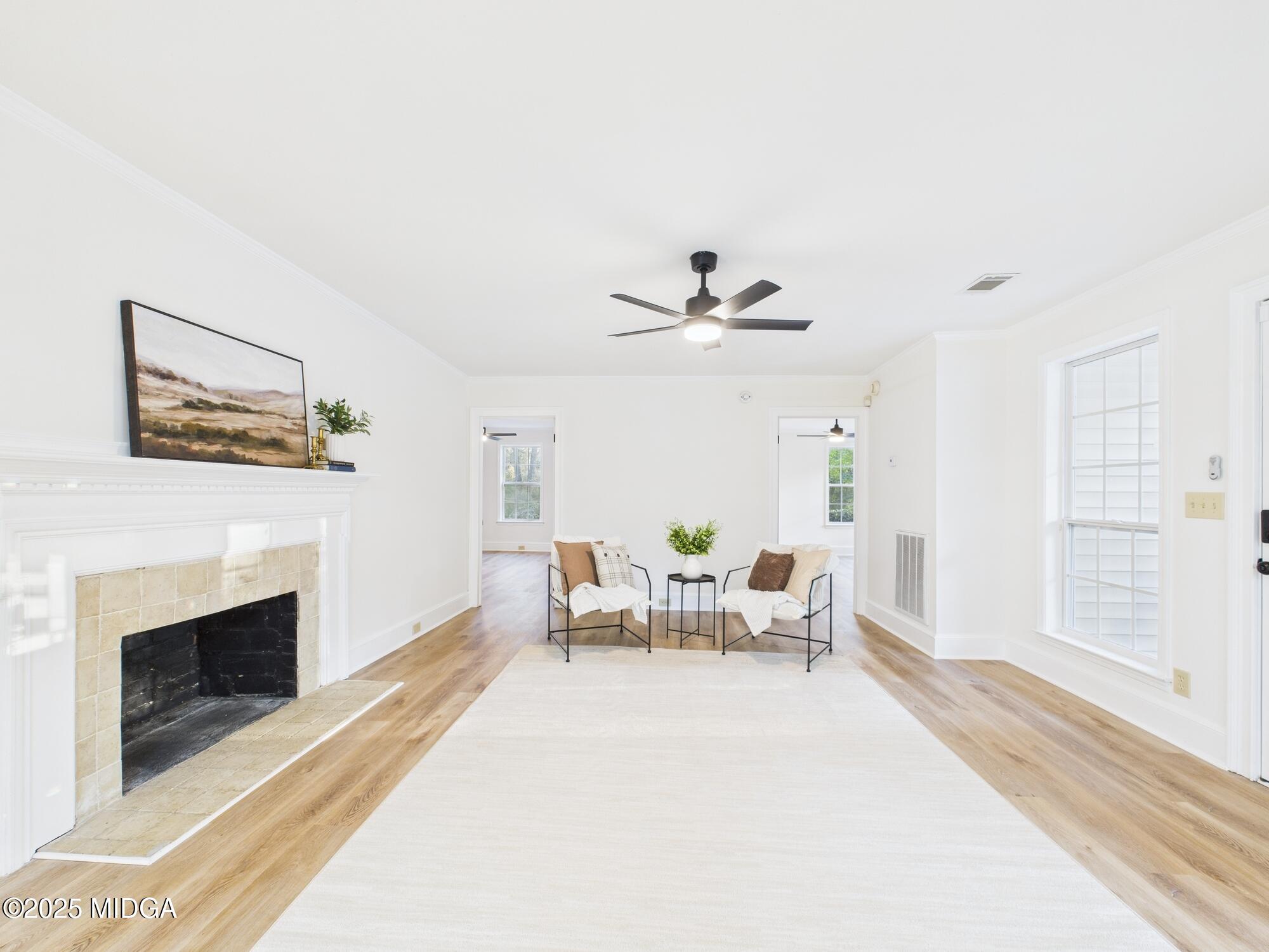 331 Marjane Drive Macon, GA 31210 - Photo 7 of 43 a living room with furniture and a fireplace