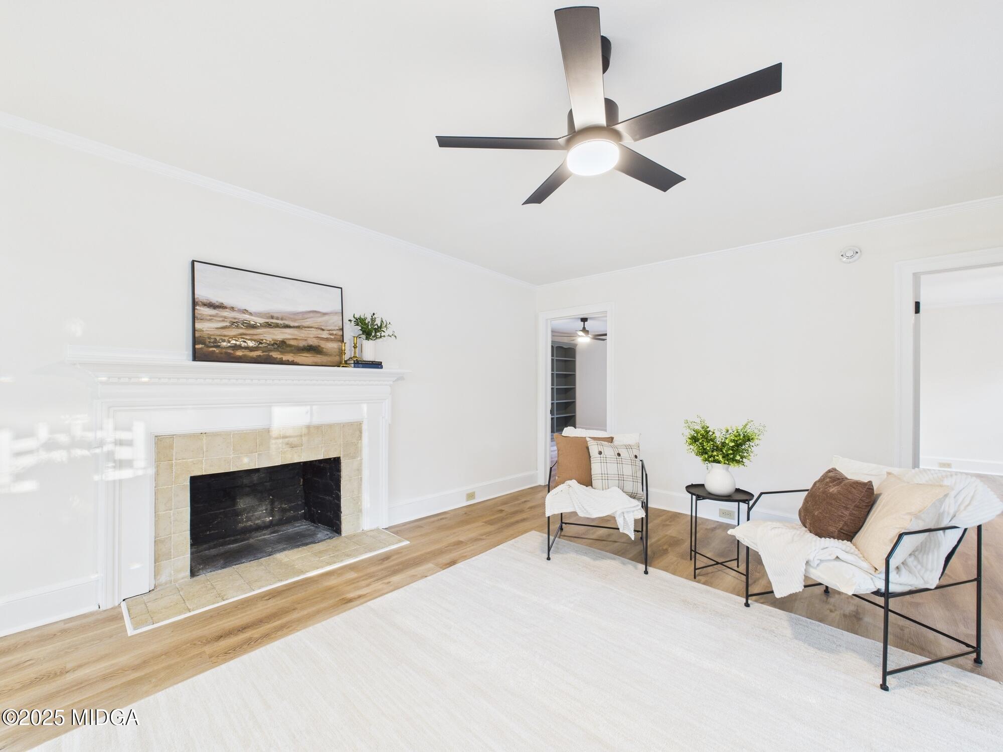 331 Marjane Drive Macon, GA 31210 - Photo 8 of 43 a living room with furniture and a fireplace