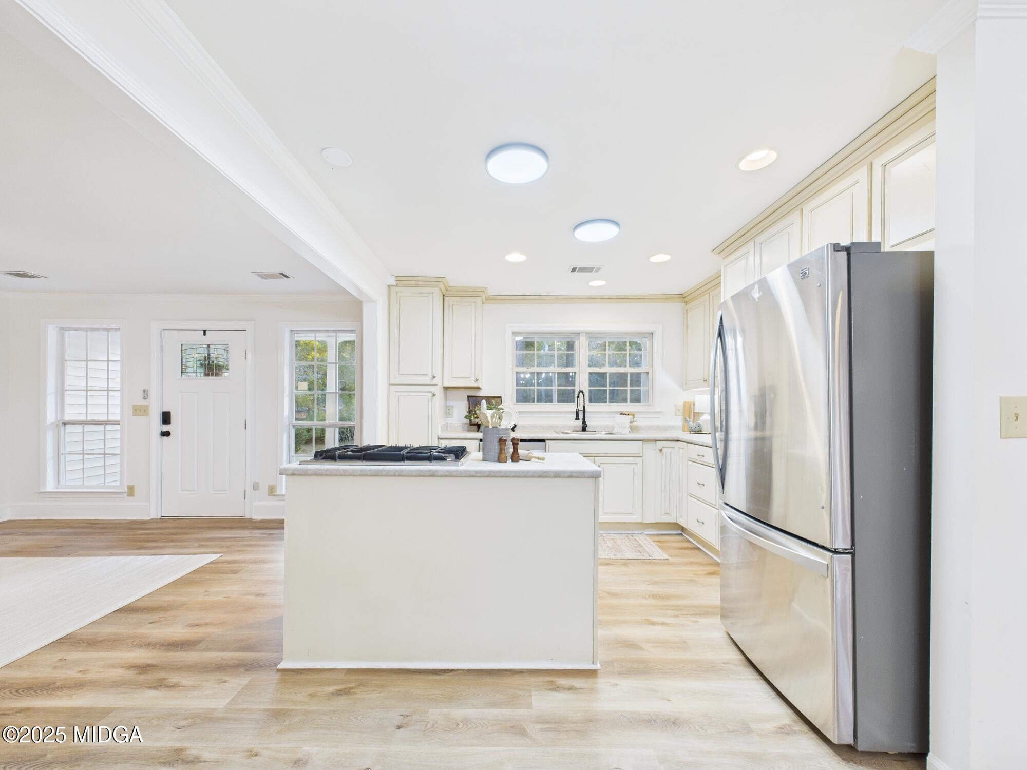 331 Marjane Drive Macon, GA 31210 - Photo 10 of 43 a kitchen with stainless steel appliances granite countertop a refrigerator and a stove top oven