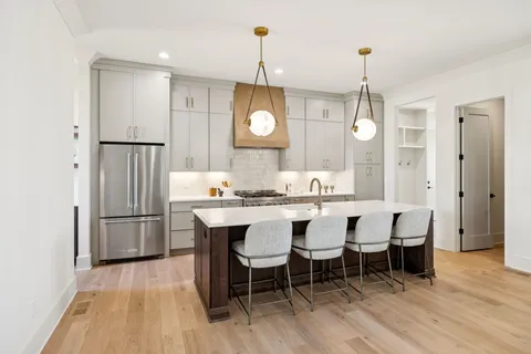a en suite bathroom with a sink and a mirror