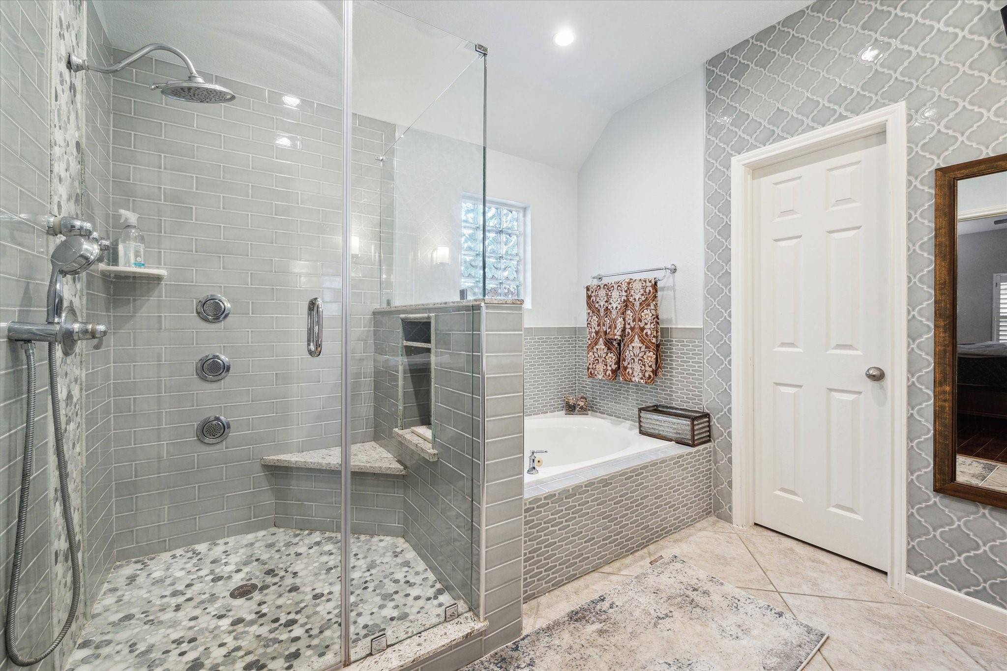 26311 Shady Walk Lane Katy, TX 77494 - Photo 15 of 25 a spacious bathroom with a bathtub and shower