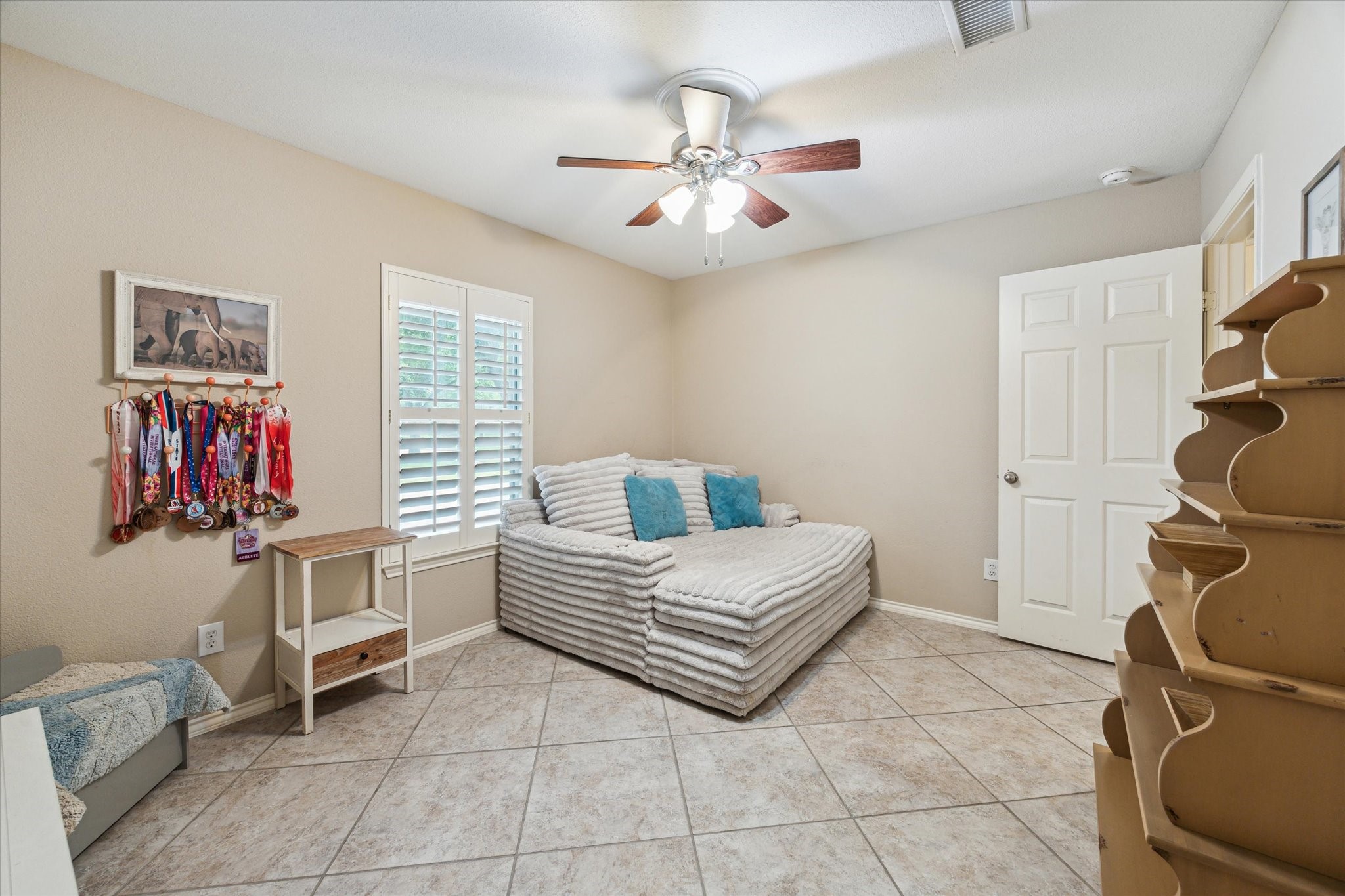 26311 Shady Walk Lane Katy, TX 77494 - Photo 20 of 25 a living room with furniture and a flat screen tv