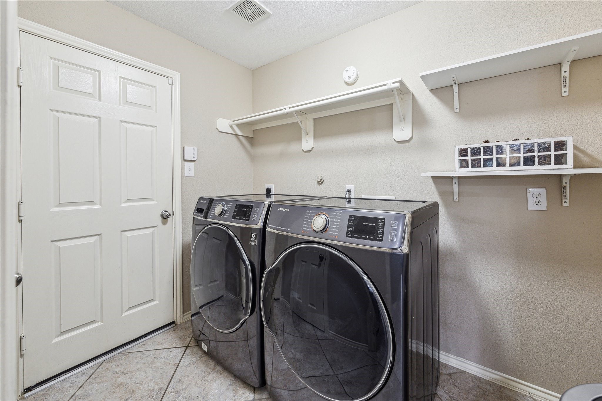 26311 Shady Walk Lane Katy, TX 77494 - Photo 22 of 25 a utility room with dryer and washer