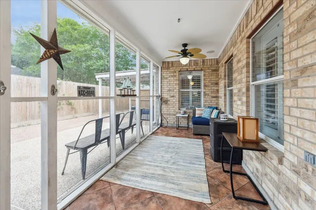 a balcony view with a seating space