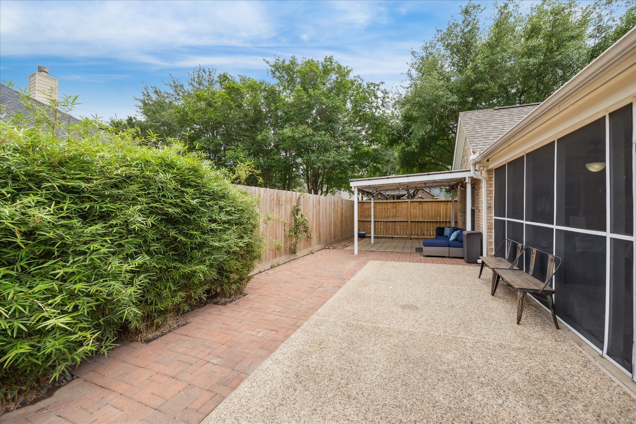 26311 Shady Walk Lane Katy, TX 77494 - Photo 25 of 25 a view of backyard with small cabin and wooden fence