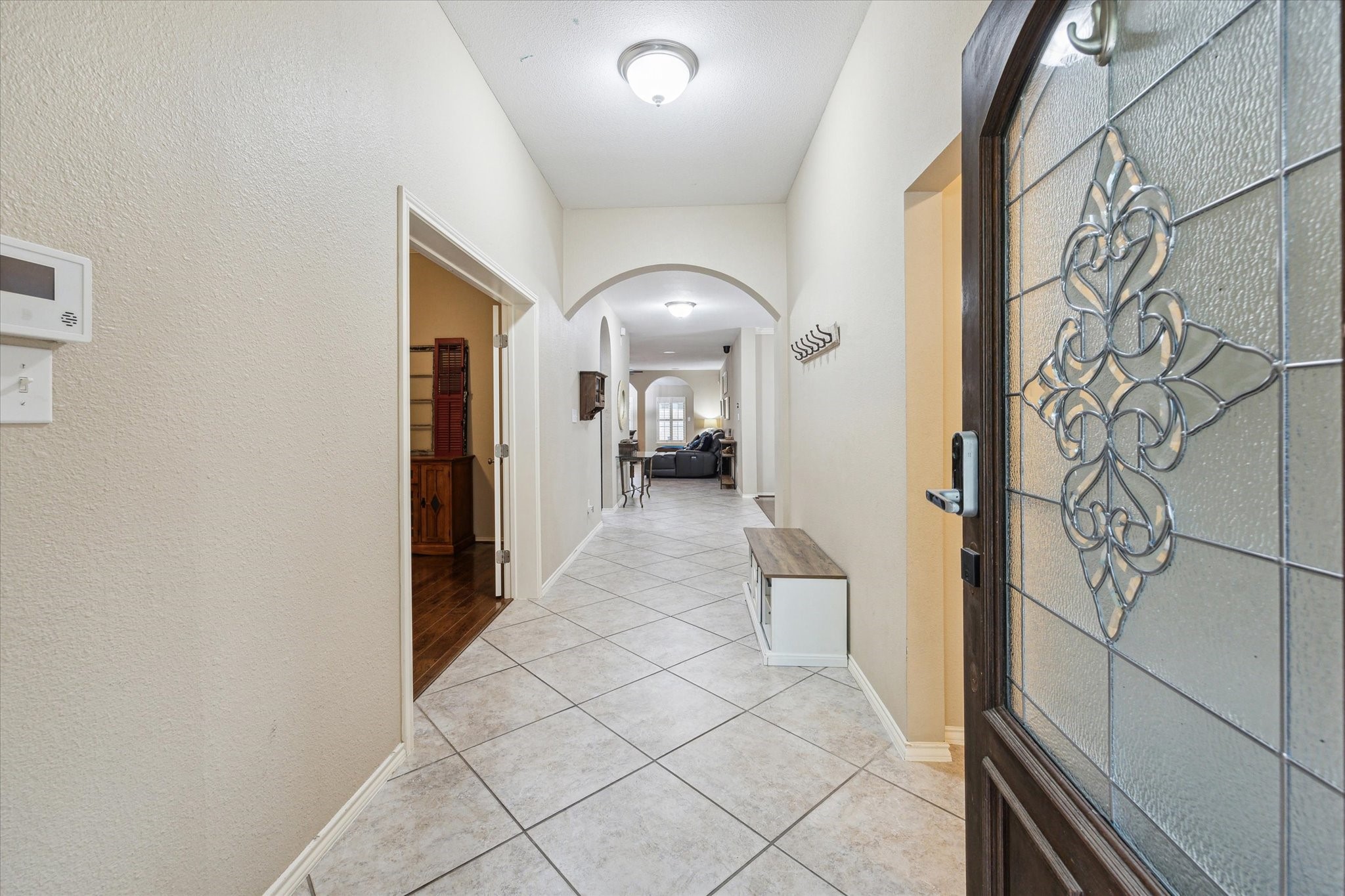 26311 Shady Walk Lane Katy, TX 77494 - Photo 3 of 25 a view of a hallway to a livingroom with furniture