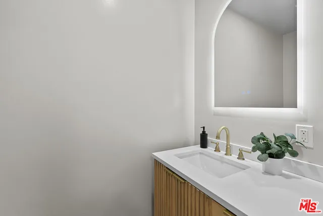 a room with gym equipment and white walls