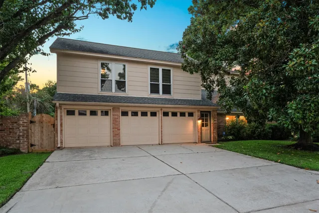a house view with a backyard
