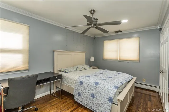 a bathroom with a granite countertop toilet sink and shower
