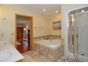 3512 Chesnee Road Rutherfordton, NC 28139 - Photo 11 of 16 a bathroom with a sink a mirror and a bath tub