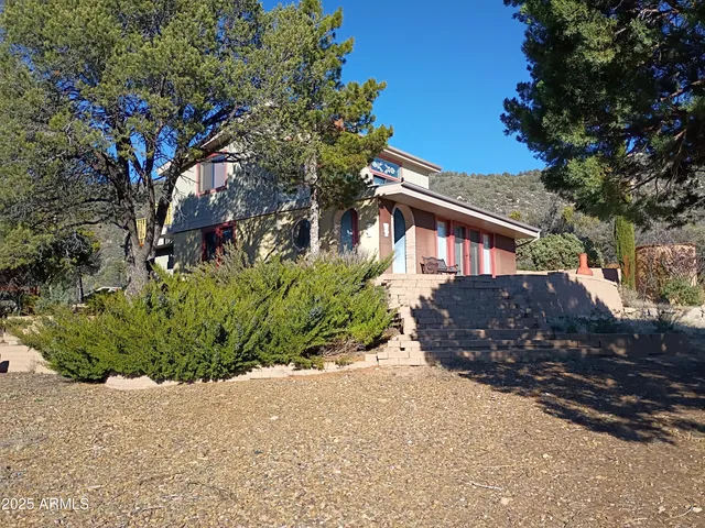 a house view with a outdoor space