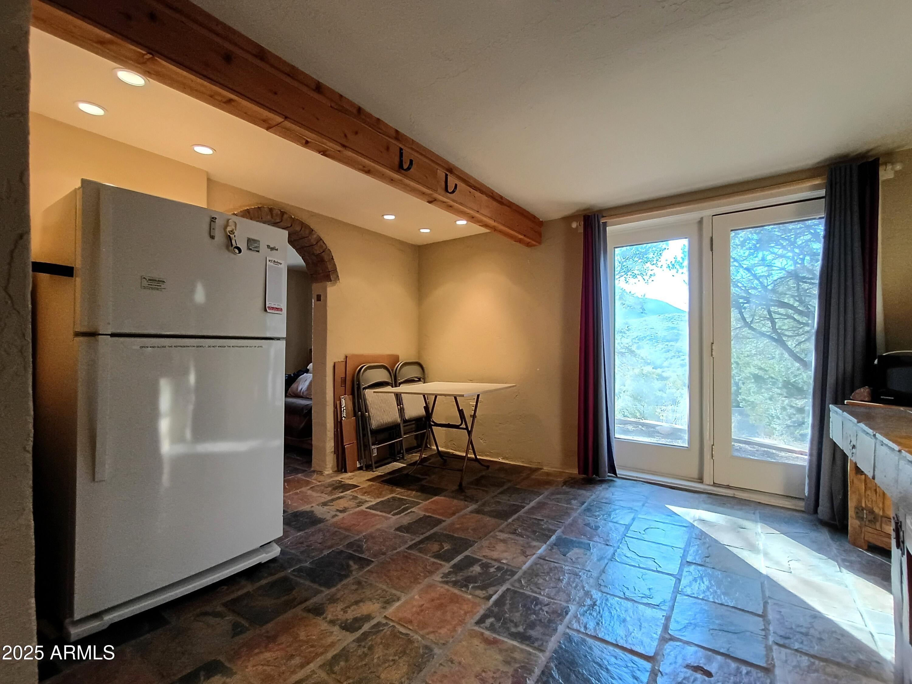 2985 North Federal Mines Road Dewey, AZ 86327 - Photo 15 of 30 a view of kitchen with furniture and refrigerator