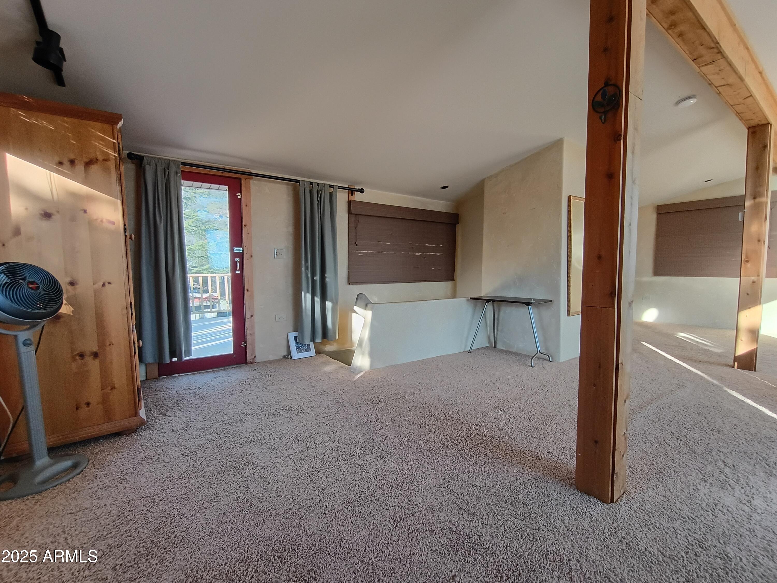 2985 North Federal Mines Road Dewey, AZ 86327 - Photo 24 of 30 a view of empty room with a fireplace