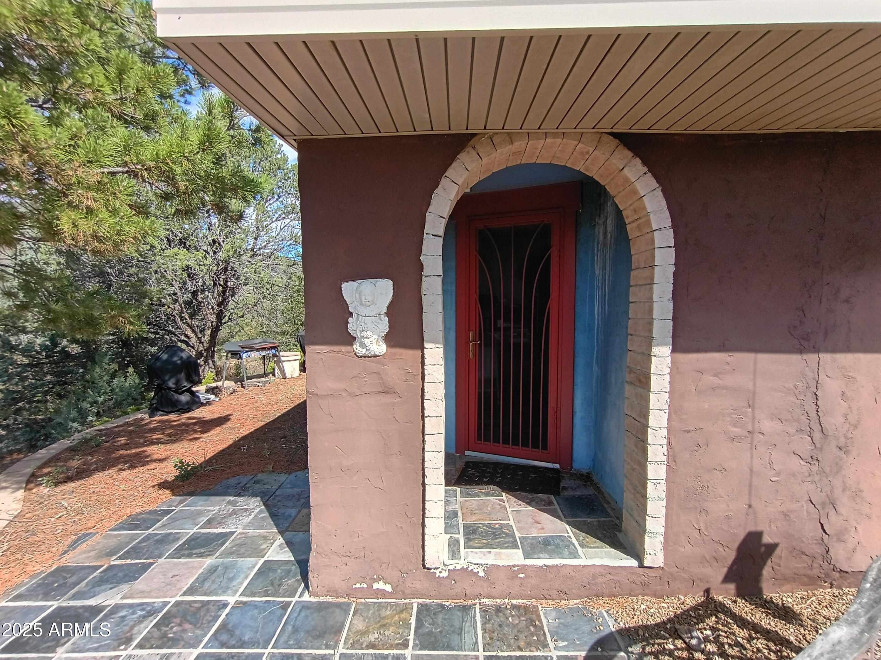 2985 North Federal Mines Road Dewey, AZ 86327 - Photo 4 of 30 a front view of a house with a yard