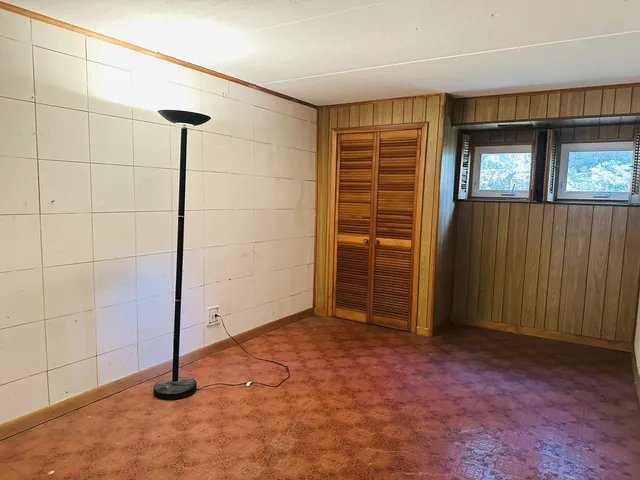 an empty room with closet