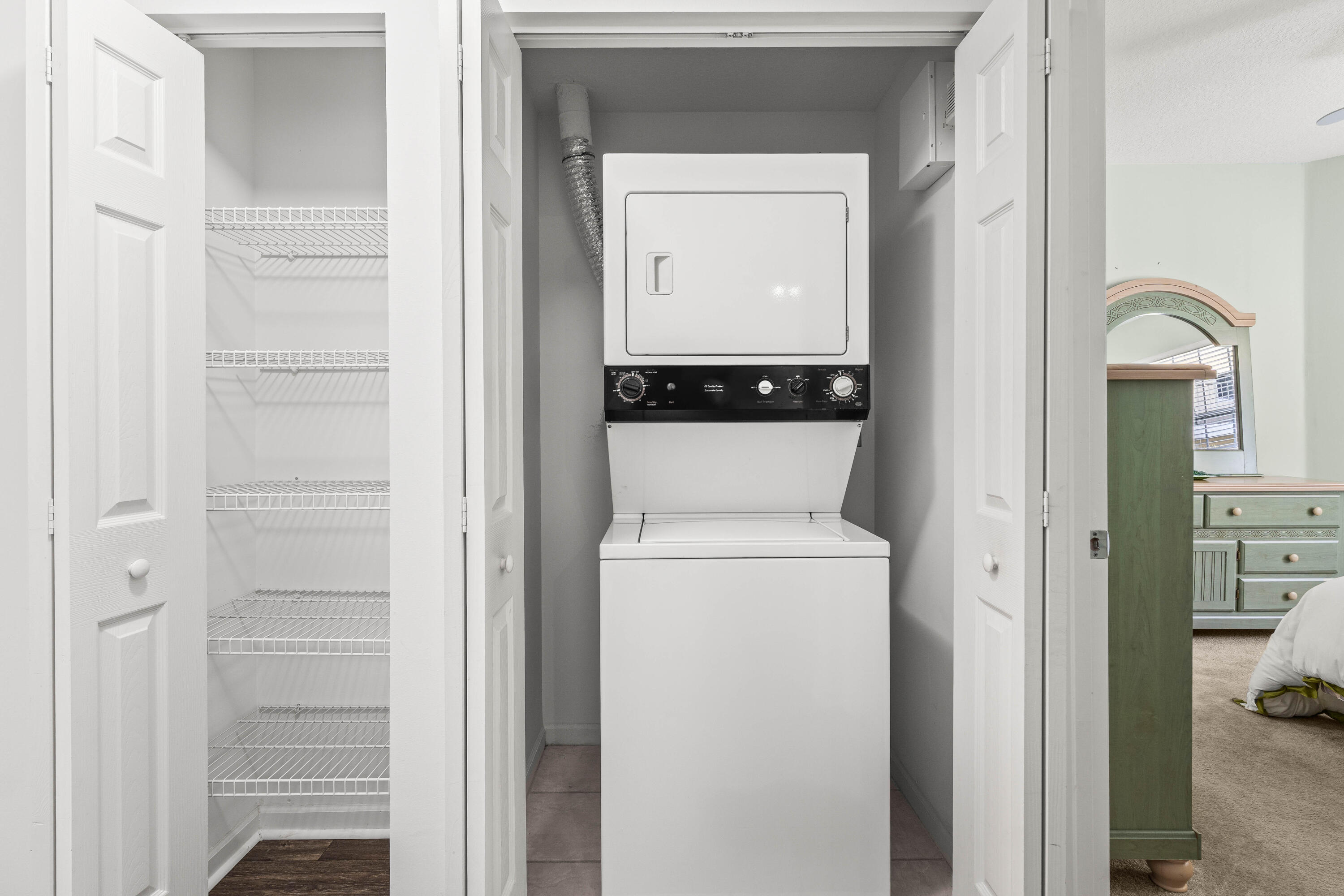 1951 Brandywine Road, Unit 207 West Palm Beach, FL 33409 - Photo 18 of 45 a view of bathroom with a washer and dryer