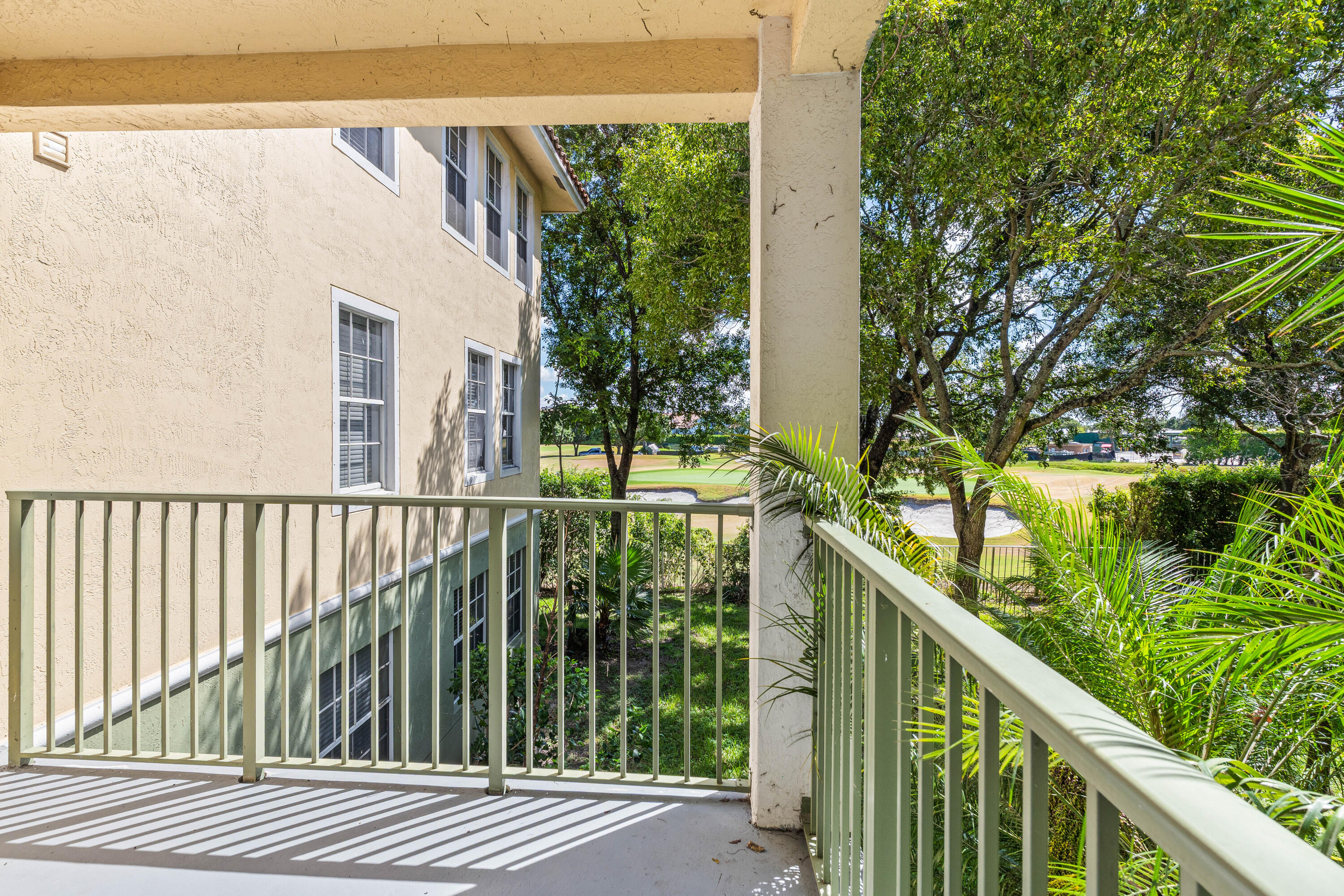 1951 Brandywine Road, Unit 207 West Palm Beach, FL 33409 - Photo 21 of 45 a view of a balcony with lake view