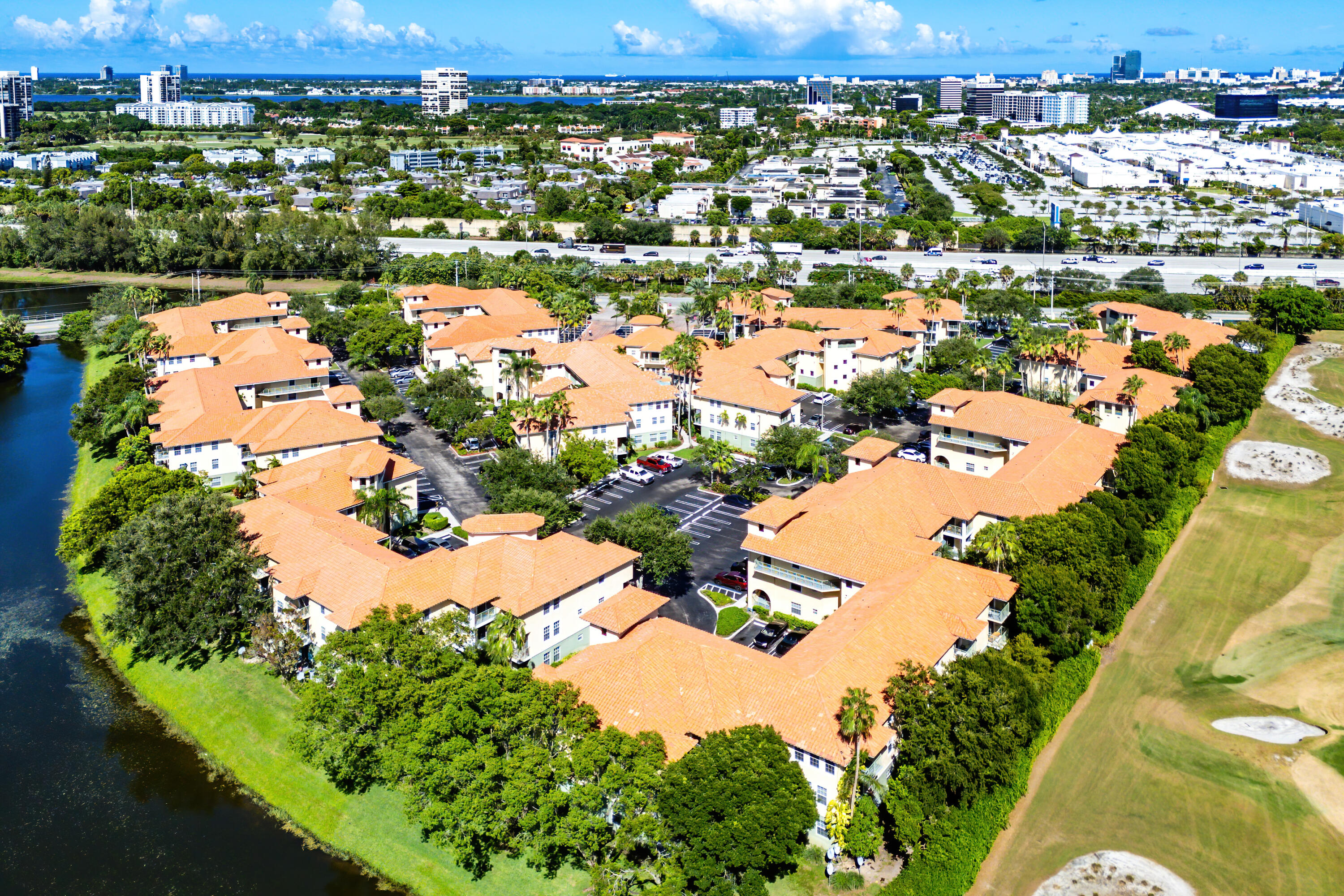 1951 Brandywine Road, Unit 207 West Palm Beach, FL 33409 - Photo 28 of 45 an aerial view of city and lake