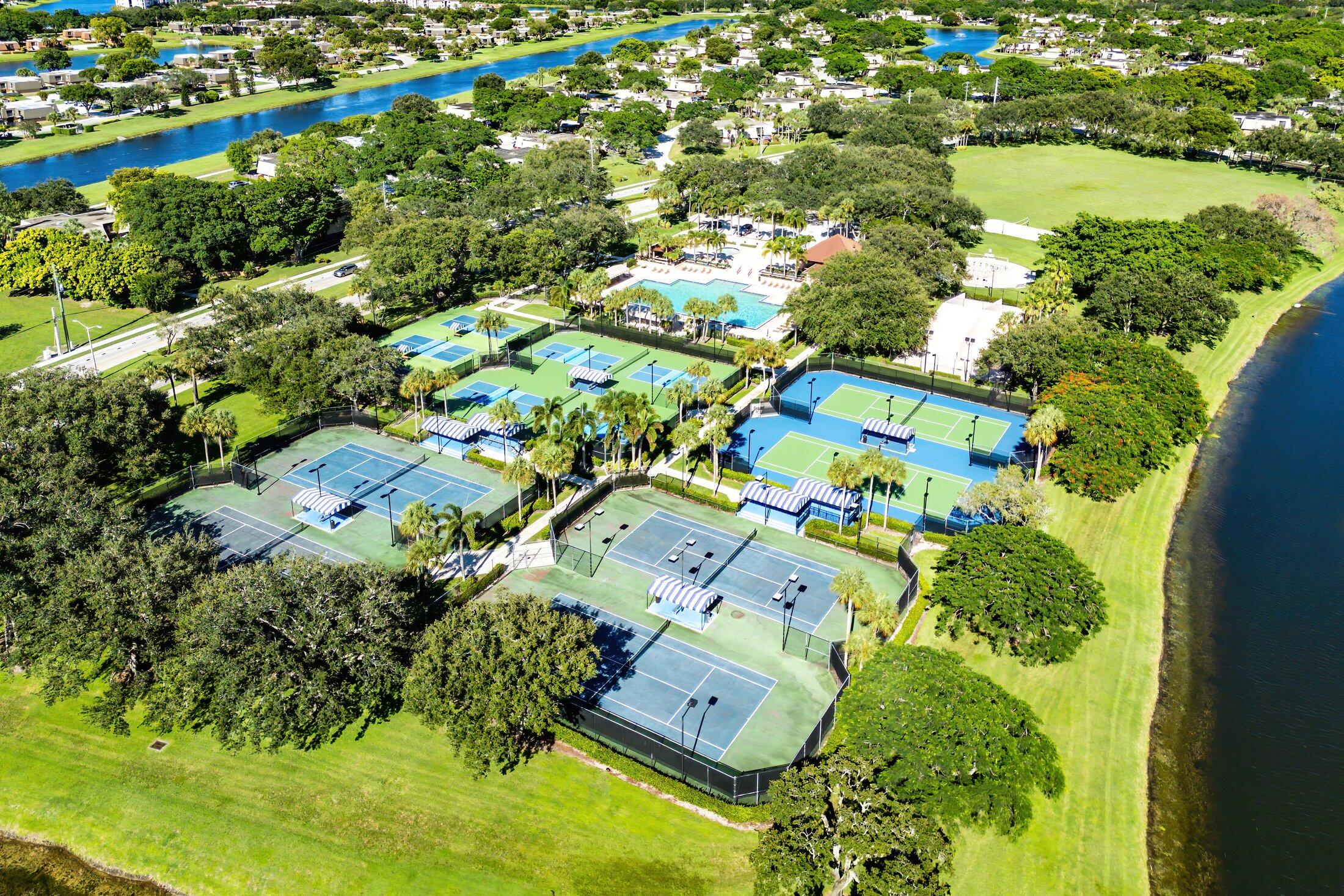 1951 Brandywine Road, Unit 207 West Palm Beach, FL 33409 - Photo 34 of 45 an aerial view of a residential houses with outdoor space and swimming pool
