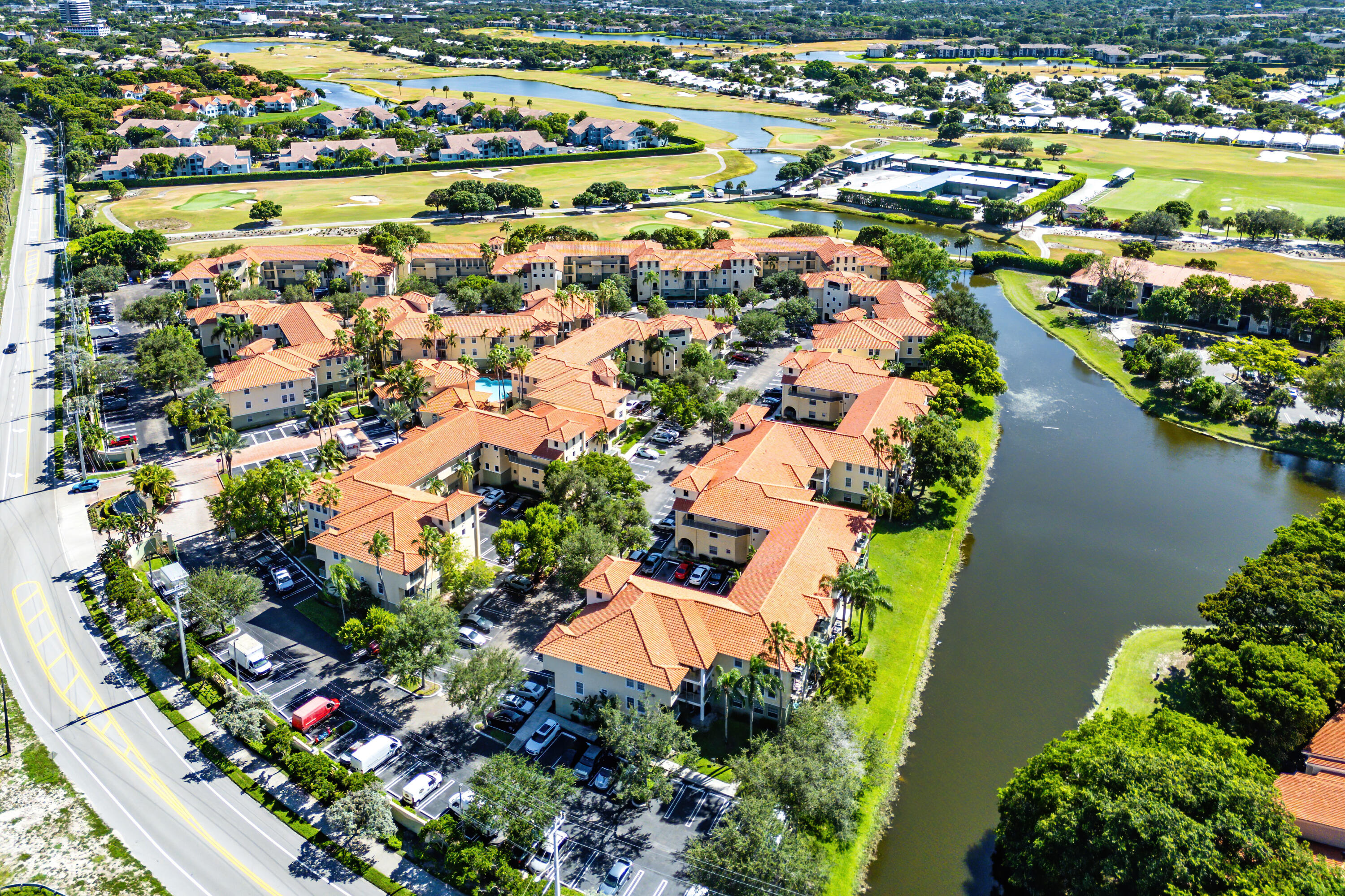 1951 Brandywine Road, Unit 207 West Palm Beach, FL 33409 - Photo 36 of 45 an aerial view of residential houses with outdoor space and lake view