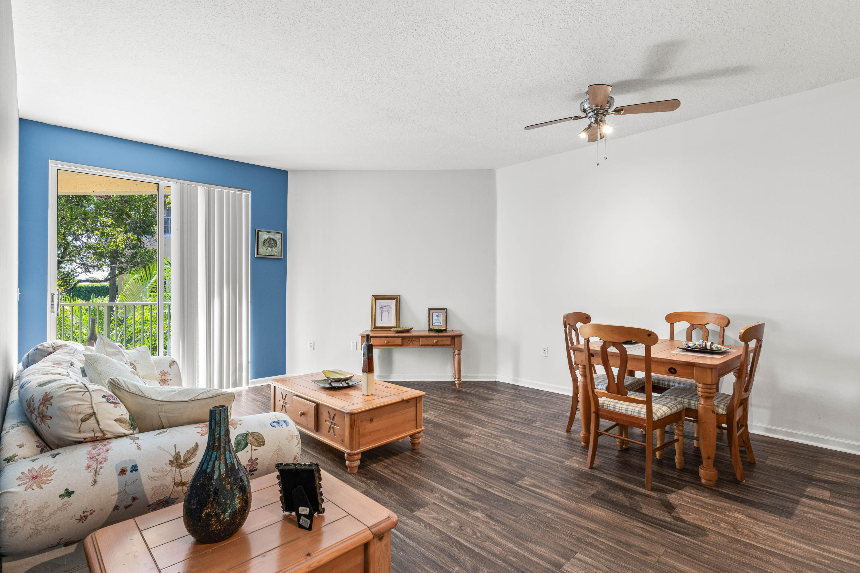 1951 Brandywine Road, Unit 207 West Palm Beach, FL 33409 - Photo 6 of 45 a living room with furniture and a window