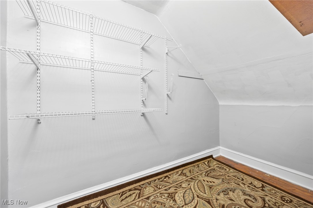 3368 Berea Road Cleveland, OH 44111 - Photo 12 of 26 Spacious closet with vaulted ceiling and wood finished floors