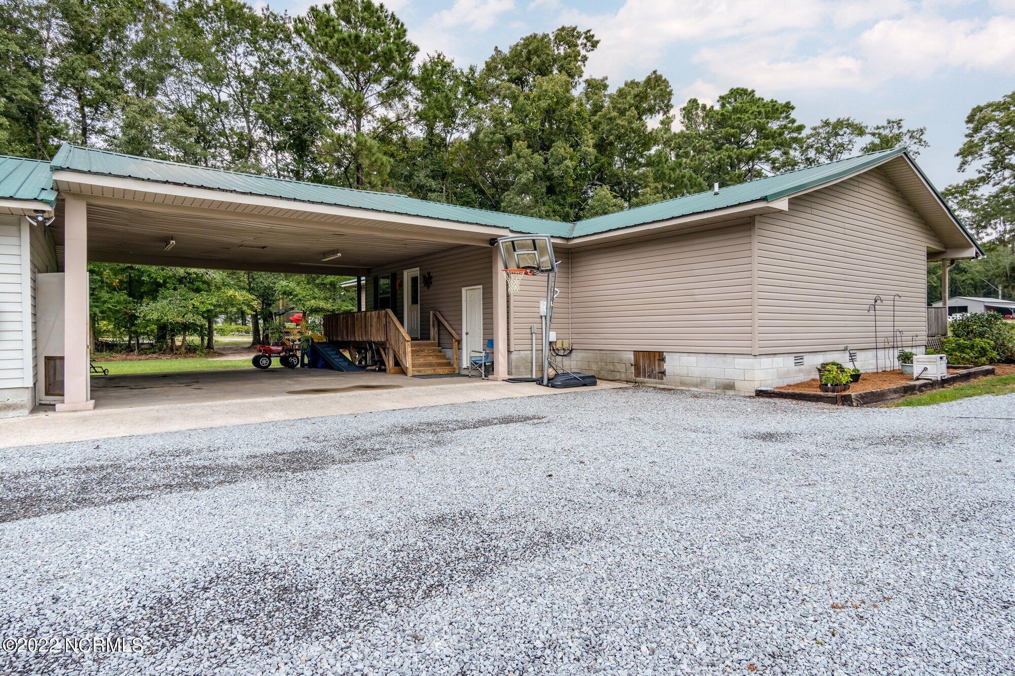 273 Sand Ridge Road New Bern, NC 28560 - Photo 25 of 29 Carport Attached to House