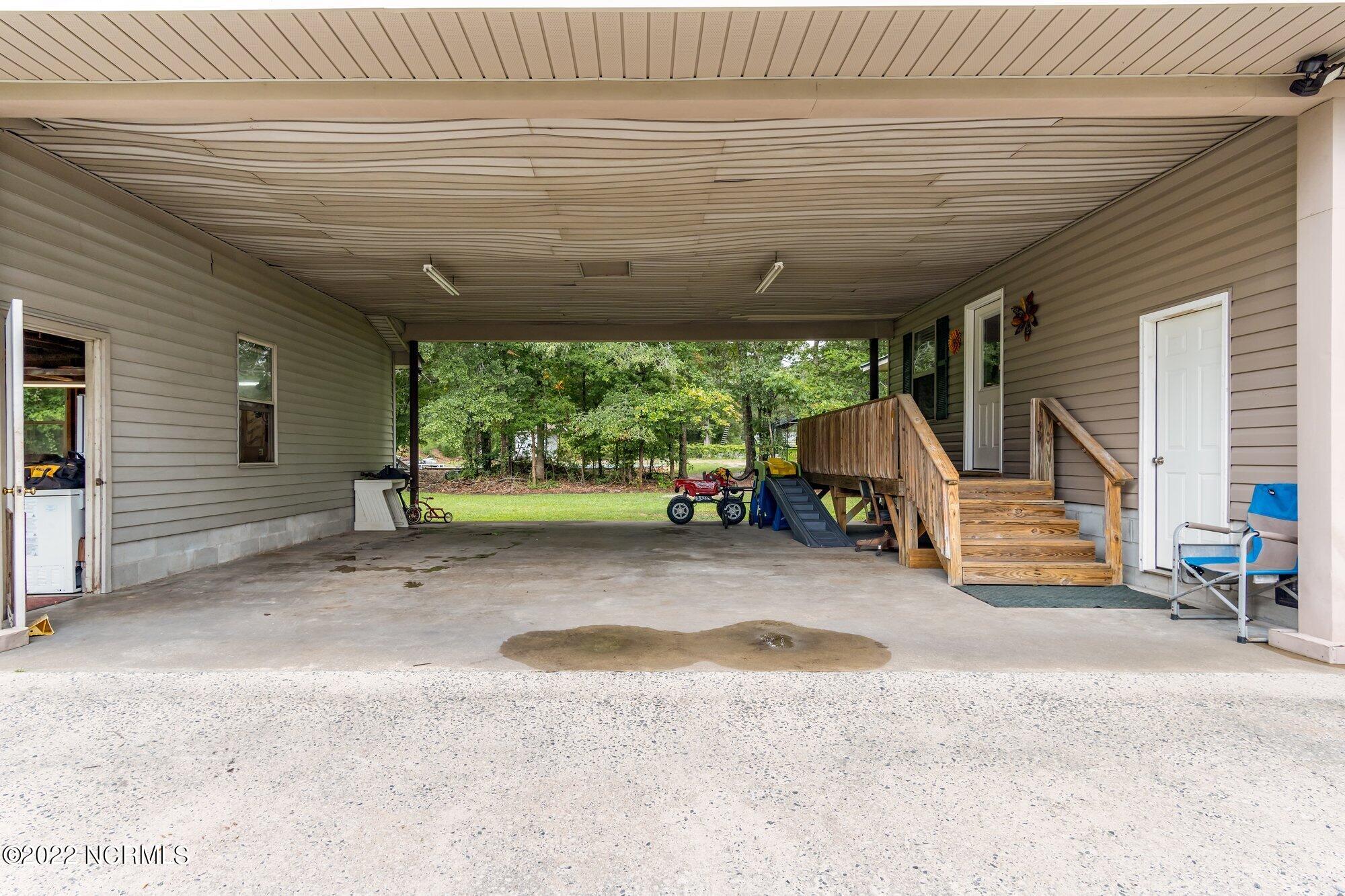 273 Sand Ridge Road New Bern, NC 28560 - Photo 26 of 29 Carport Attached to House