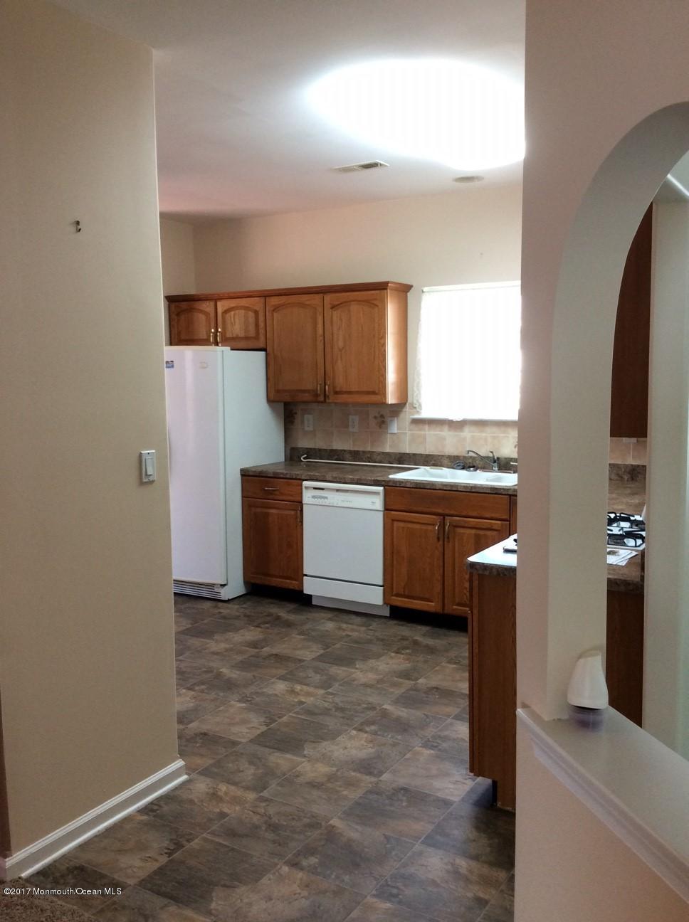 77 Eleanor Road Manchester Township, NJ 08759 - Photo 6 of 20 view of kitchen from living room 10-28-1
