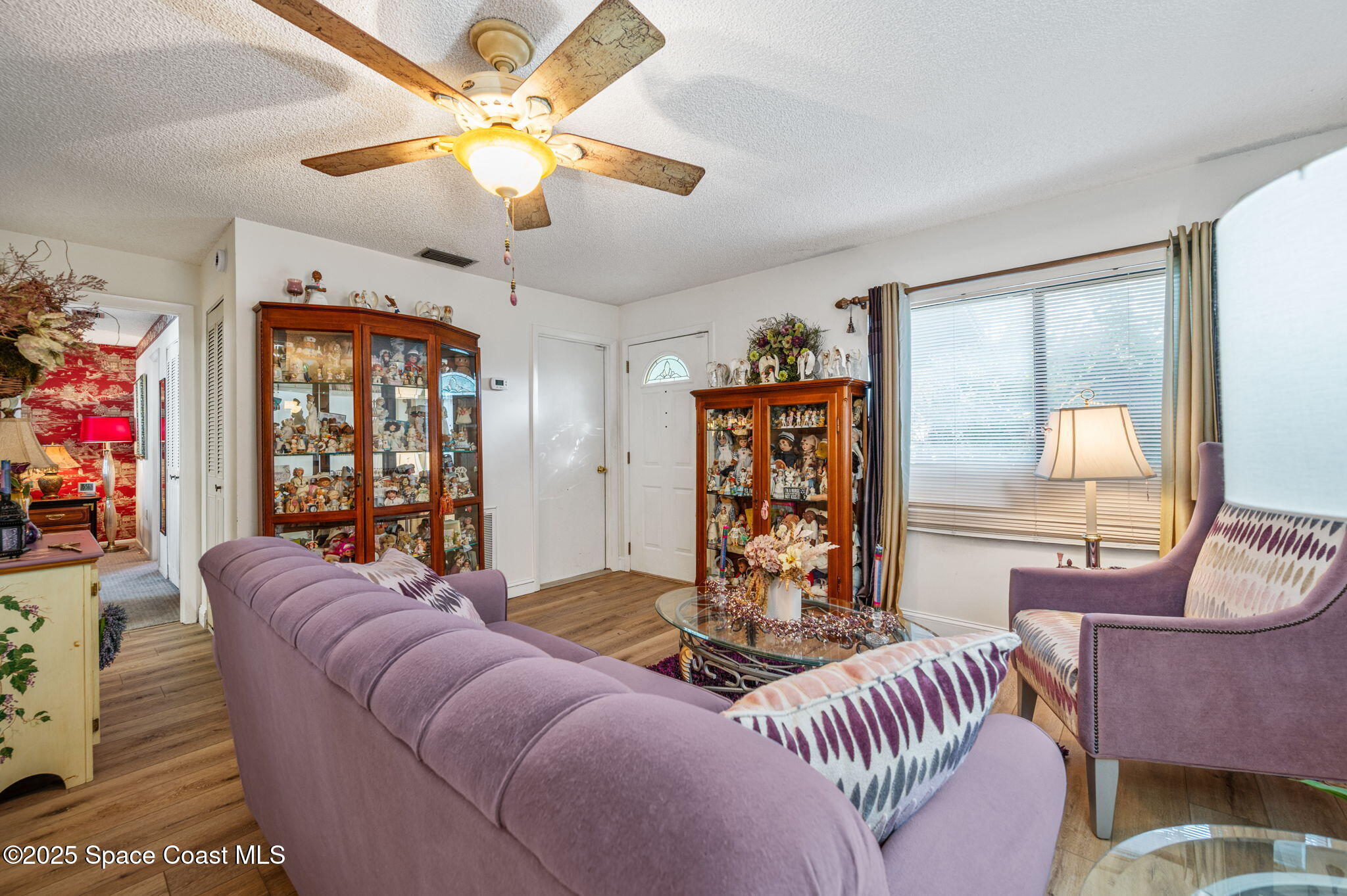 5220 Holden Road Cocoa, FL 32927 - Photo 13 of 31 a living room with furniture and a large window