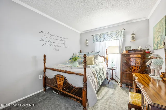 a bedroom with furniture and a bed