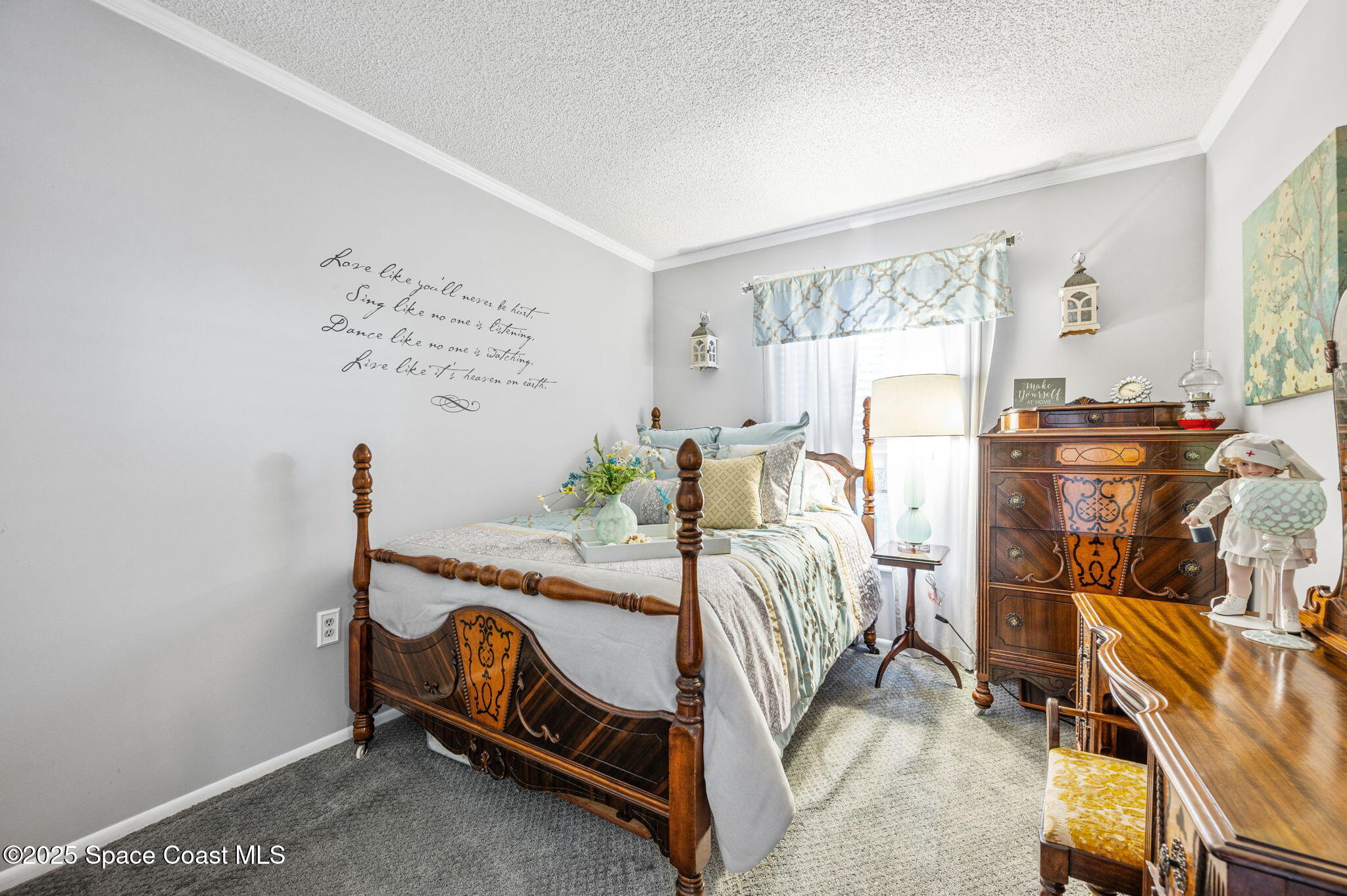 5220 Holden Road Cocoa, FL 32927 - Photo 27 of 31 a bedroom with furniture and a bed