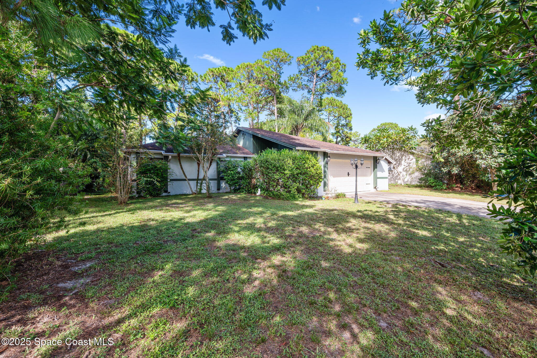 5220 Holden Road Cocoa, FL 32927 - Photo 3 of 31 a view of a house with a yard
